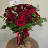 This Romantic Flower Arrangement contains: 9 red roses, 7 red carnations, mini