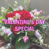 Valentine's Day design of red roses, pink, pastel, white blooms with light