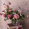 This is a small and perfect arrangement to give as a sweet