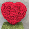 150 vibrant red roses in a stunning arrangement&mdash;a remarkable work of art