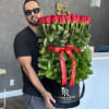 A magnificent standing bouquet of red roses is an unforgettable gift for