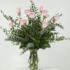 Twelve light pink roses that will softly warm the home, heart and