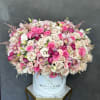 Large pink and cream rose arrangement in a white hat box