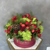Beautiful Christmas arrangement with branches of the Christmas tree, ornaments, and fresh