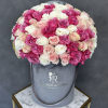 A stunning 75-rose arrangement presented in our Signature grey box makes a