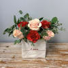 Available for Valentine&rsquo;s Day

Blush pink roses and red carnations in a narrow