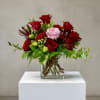 A breathtaking arrangement that speaks of love, devotion, and individuality. Eleven deep