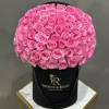 A lovely arrangement of 75 pink roses in our black signature box