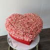 A magnificent work of art, this enormous heart-shaped box contains 250 freshly