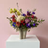 Ooh LALA is a bold, colorful arrangement featuring premium blooms like proteas
