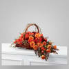 This Arrangement uses a rich sunset orange color to present an elegant