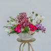 A striking blend of refined elegance and modern luxury, this floral arrangement