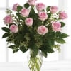 Soft as a whisper, this pretty bouquet of pink roses and deep
