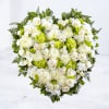 Celebrate a life well-lived with the elegant Timeless Serenity Heart arrangement. This