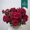 Ignite romance and sophistication with our Ruby Velvet Arrangement. This stunning, monochromatic