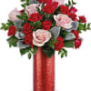 Red Shimmering textured tall glass vase filled with Pink roses and red