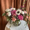 A bouquet of premium focal florals with a designer-selected mix of seasonal