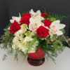 This gorgeous showstopper comes in a large red crackle vase and is