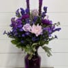 Assortment of beautiful purple flowers with a touch of lavender , perfect