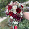 Red  Cascade bouquet mix of natural flowers 