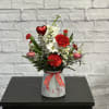 Sweet and tender, this bouquet of carnations, daisies, tulips and stock will