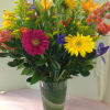 Roses, Sunflowers, Snapdragons, Gerbera Daisies, Alstromeria, ,Solidago, Fancy Greens