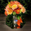 Pumpkin Spice Centerpiece is an orange fusion of gorgeous florals, great for