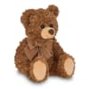 Meet Lil' Reggie, a charming teddy bear from the Bearington Collection. This