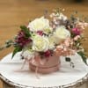 This charming Valentine's arrangement features a soft romantic palette arranged in a