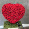 A breathtaking and touching free-standing heart arrangement with moss and freshly cut