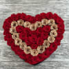 This breathtaking heart-shaped preserved arrangement features a striking pattern of gold and