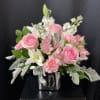 Presented in a Silver mercury glass cube this delightful assortment of pink