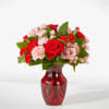 As sweet as candy, this pink and red arrangement is sure to