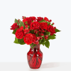 A valentine in bloom, this all red arrangement of roses, carnations and