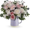 Gift Mom timeless elegance with our Teleflora's Sweetest Flutter pitcher. This food-safe