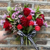 Red Roses and Tulips, Lavender and Pink accent florals and greens in