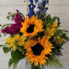 A colorful arrangement showcasing fun flowers, sure to brighten anyone's day! 
