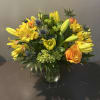 Bright and bold mix of blooms!
Measures approx. 18"Tx17"W and arrives in a