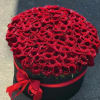 75 fresh red roses put together in a black box and topped