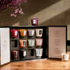 12 votives of Voluspa's most popular scents including Goji Tarocco Orange, Baltic