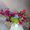 A gorgeously vibrant mix of fresh, hand-picked seasonal blooms. Featured in a