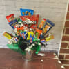 Tin bucket filled with assorted snacks to send to your favorite bearcat!