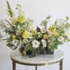 Treat yourself to this long and low arrangement that gives all the