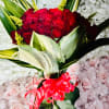 bouquet of 36 roses with natural foliage wrapping