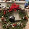 large balsam wreath with decorations
