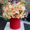 Brighten any space with our Elegant Flower Box Arrangement! Bursting with vibrant