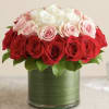 Tri-Layer Rose Elegance 
Brighten someone&rsquo;s day with this stunning rose arrangement &mdash;