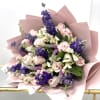 Lavender Whispers is a delicate harmony of pastel romance and bold florals.