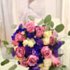 This bouquet feels like a romance- as if evening light touched silk