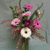 Tall clear vase full of beautiful blooming Gerbera Daisy's &amp; more! 
